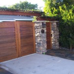 gate design with wooden driveway and people gates