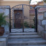 gate design with ornamental iron work