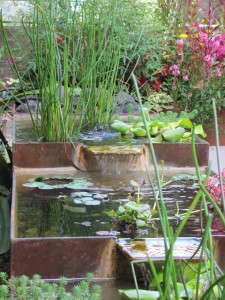 self-contained water feature made from naturally rusted steel